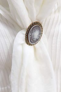 Close-up of a clock over white background