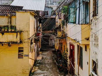 Alley amidst buildings in city