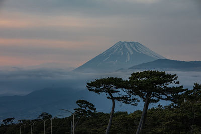 Scenic view of mountains against sky during sunset