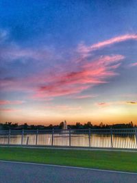 Scenic view of beach against sky during sunset