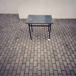 Chairs on cobblestone