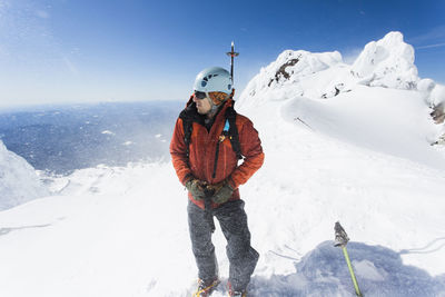 A man climbs down from the summit of mt. hood in oregon.