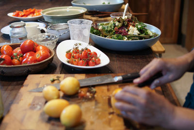 Man preparing food on cutting board
