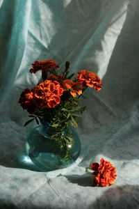 High angle view of flower vase on table