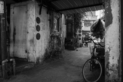 Rear view of man working on building