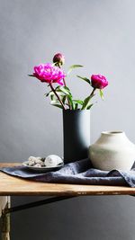 Flower vase on table