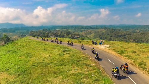 High angle view of people on road against sky