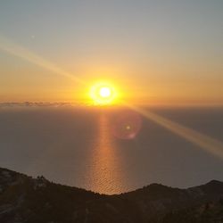 Sun shining through clouds