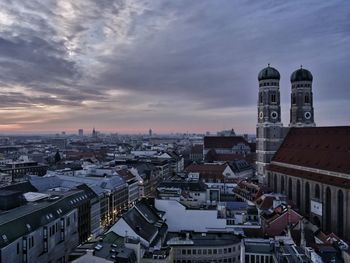 High angle view of city at sunset