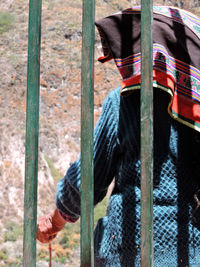 Rear view of woman standing outdoors