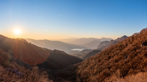 Scenic view of mountains against clear sky