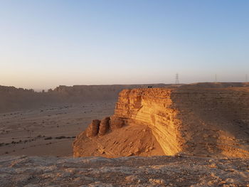 Scenic view of desert against clear sky