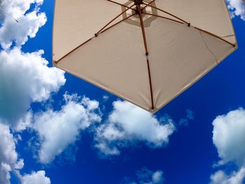 Low angle view of umbrella against sky