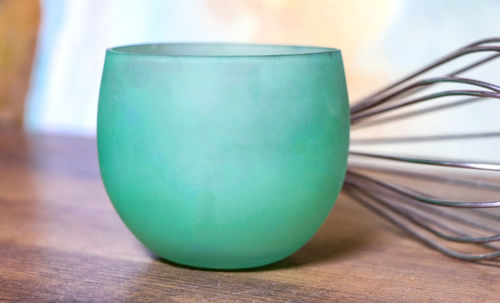 Close-up of green juice on table