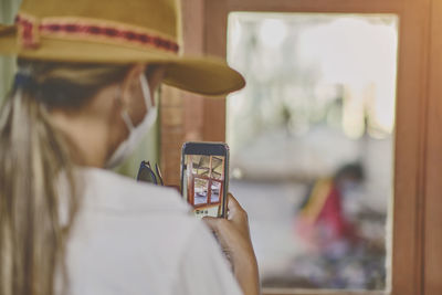 Young woman using mobile phone