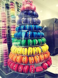 Stack of multi colored candies in shop