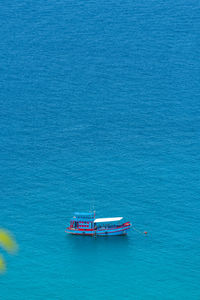 High angle view of ship sailing in sea