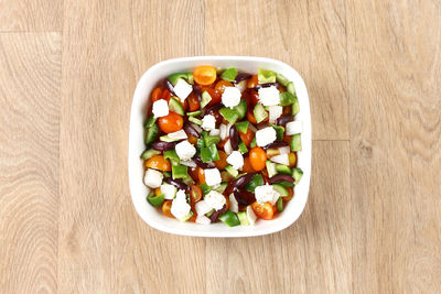 High angle view of salad in bowl on table