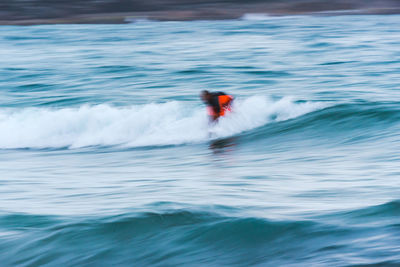 Man surfing in sea