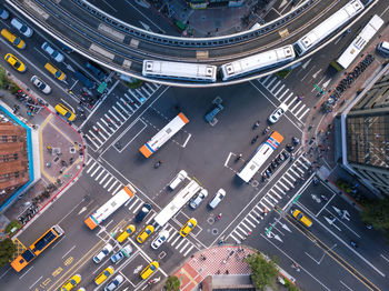 High angle view of vehicles on road in city