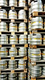 Full frame shot of beer barrels arranged on pallets