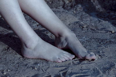 Low section of woman on beach