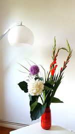 Close-up of flower vase on table