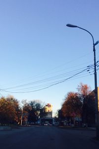 View of road against clear blue sky