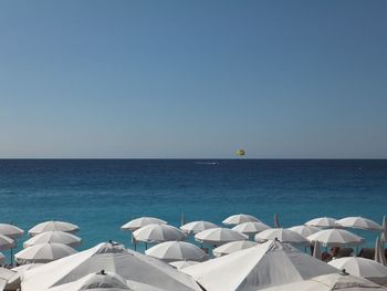 View of calm sea against blue sky