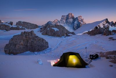 Scenic view of snow covered mountain against sky