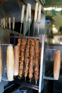 Close-up of meat on skewers