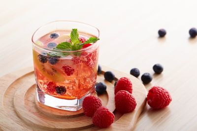 Close-up of fruits in glass on table