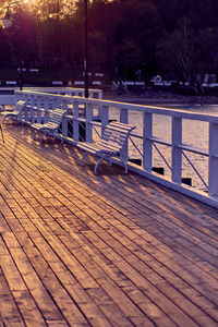 Empty table and chairs at night