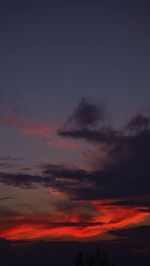Low angle view of dramatic sky during sunset