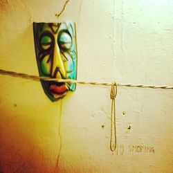 Close-up of painting on wall