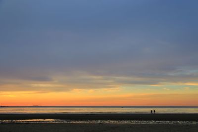 Scenic view of beach during sunset