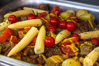 Baby corn with vegetables and meat