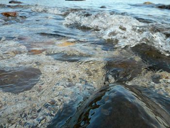 Close-up of wave on beach