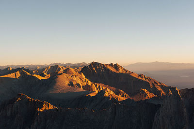 Scenic view of mountains against sky during sunset