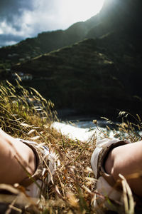 Midsection of woman hand on mountain