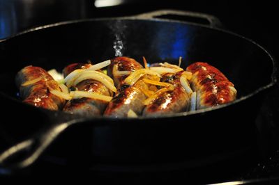 Close-up of sausages in cooking pan