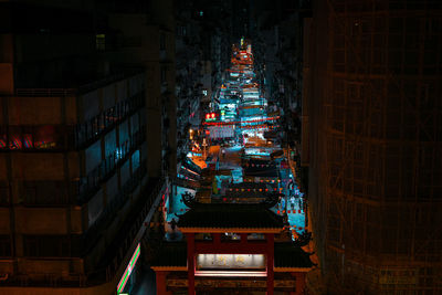 High angle view of illuminated buildings at night