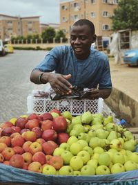 Man selling fruits on street