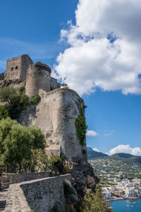 Low angle view of fort against sky