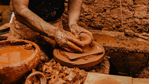 Man working in pottery 