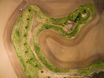 Aerial view of tractor on agricultural field