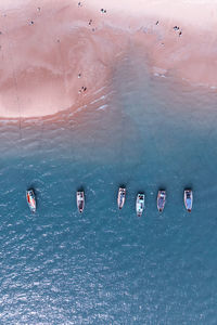 Aerial view of boats moored in sea