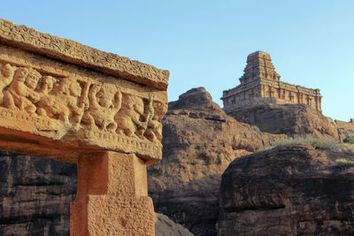 Low angle view of old ruins against sky