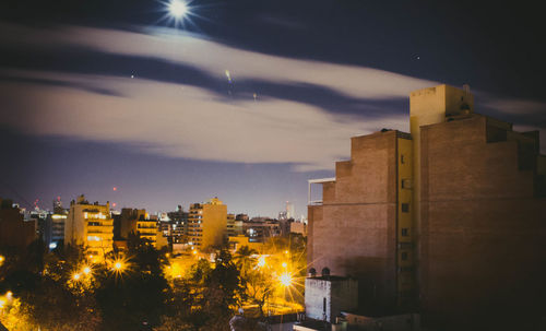 High angle view of buildings at night