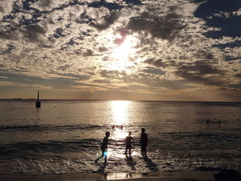 Scenic view of sea against sky at sunset